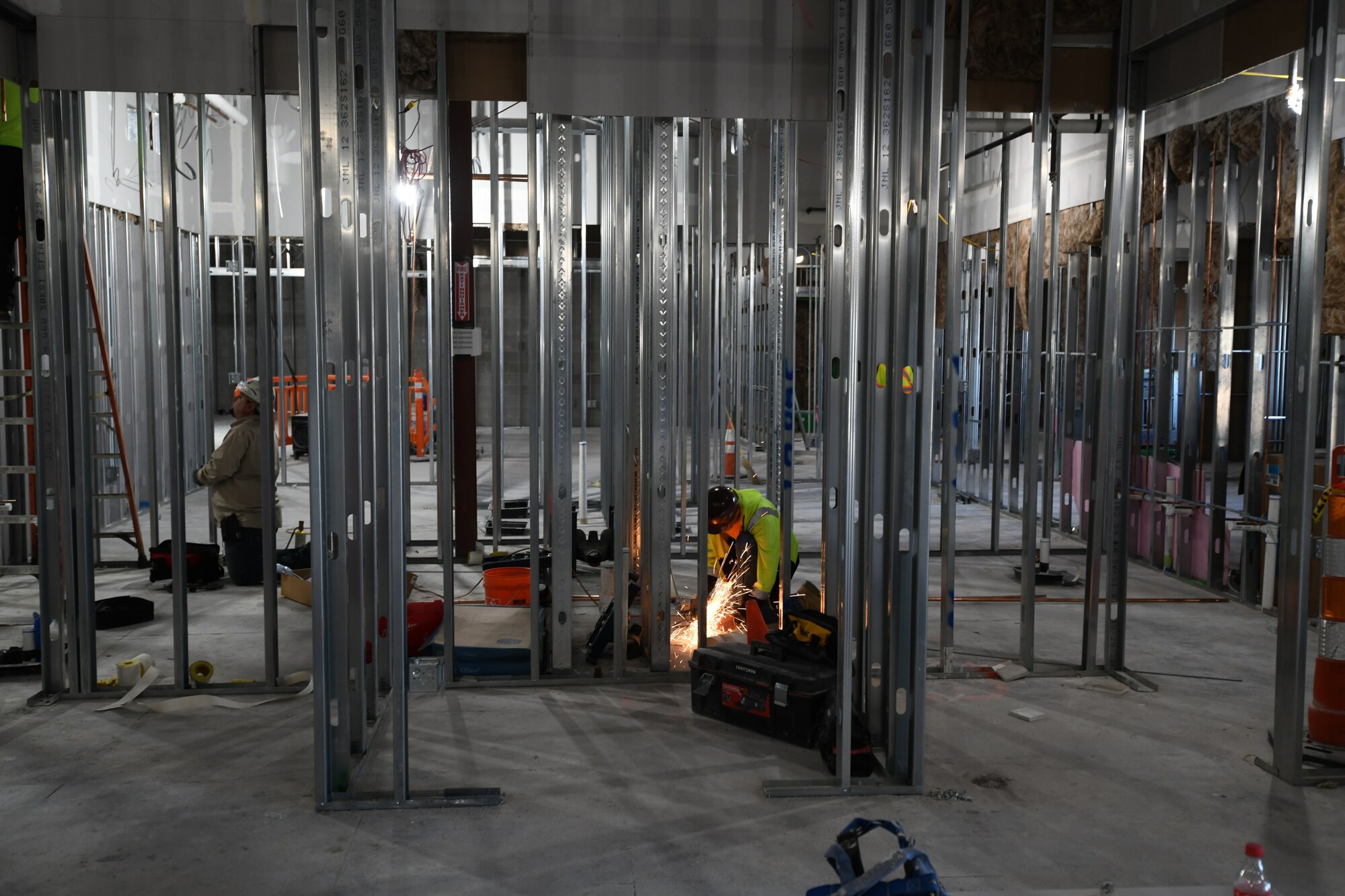 construction worker works on building