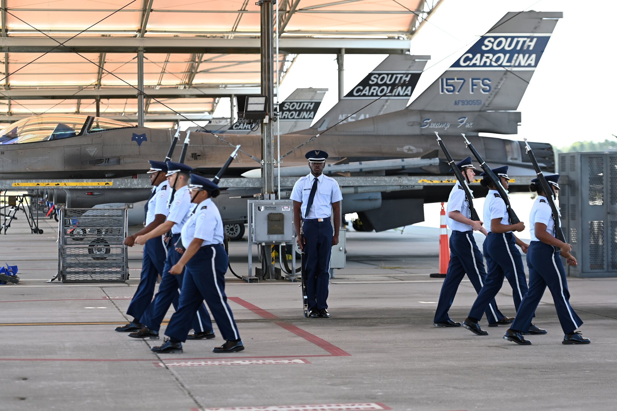 The Spring Valley High School ‘Fancy Squad (armed)’ team from Columbia, South Carolina, competes during the annual Top Gun Drill Meet at McEntire Joint National Guard Base, South Carolina, March 26, 2022. High School Junior Reserve Officers Training Corps cadets from 20 high schools across the state competed in twelve drill and ceremony events sponsored by the South Carolina Air National Guard. (U.S. Air National Guard photo by Master Sgt. Caycee Watson)