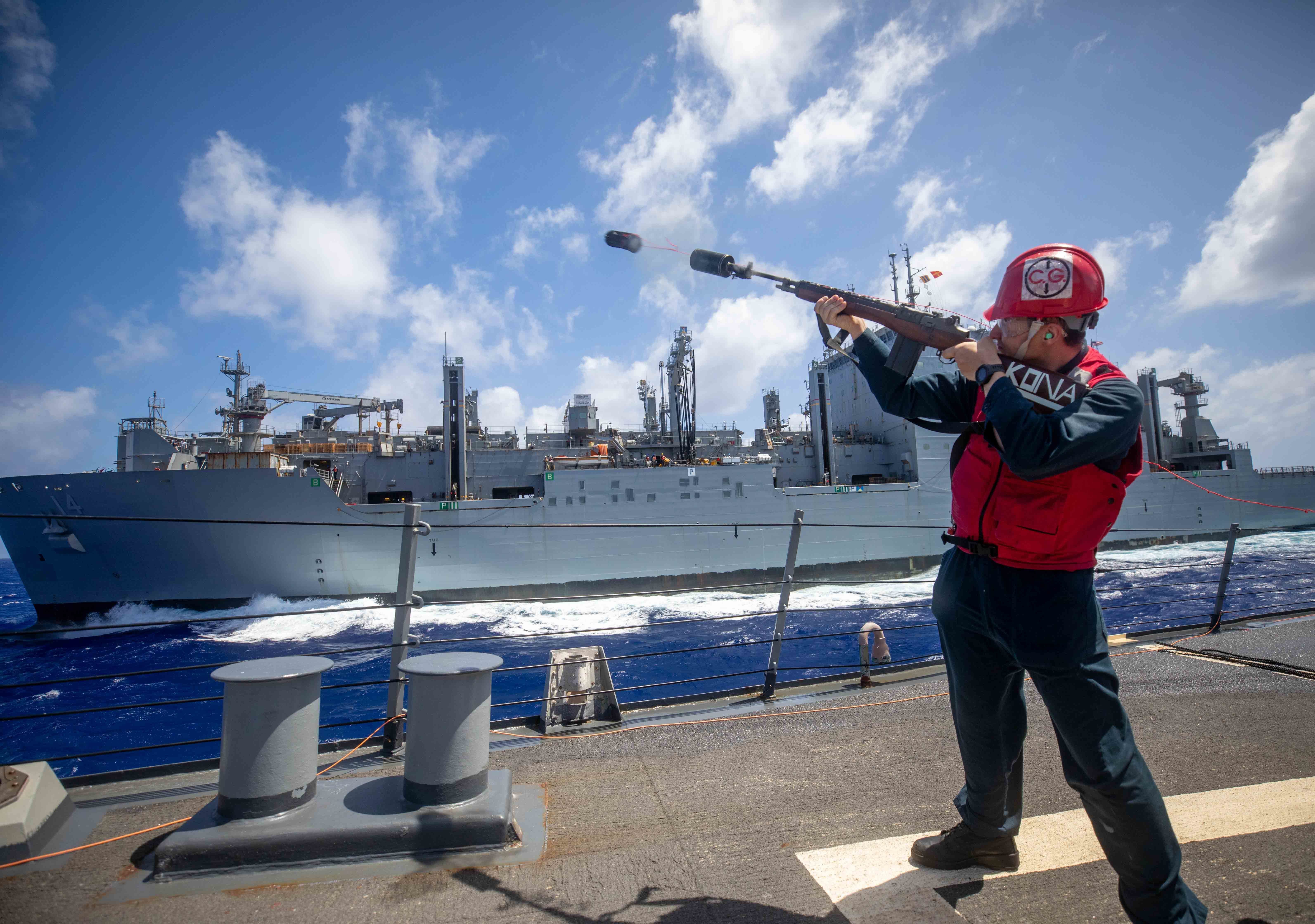 USS Milius (DDG 69) replenishes from USNS Cesar Chavez (T-AKE 14).