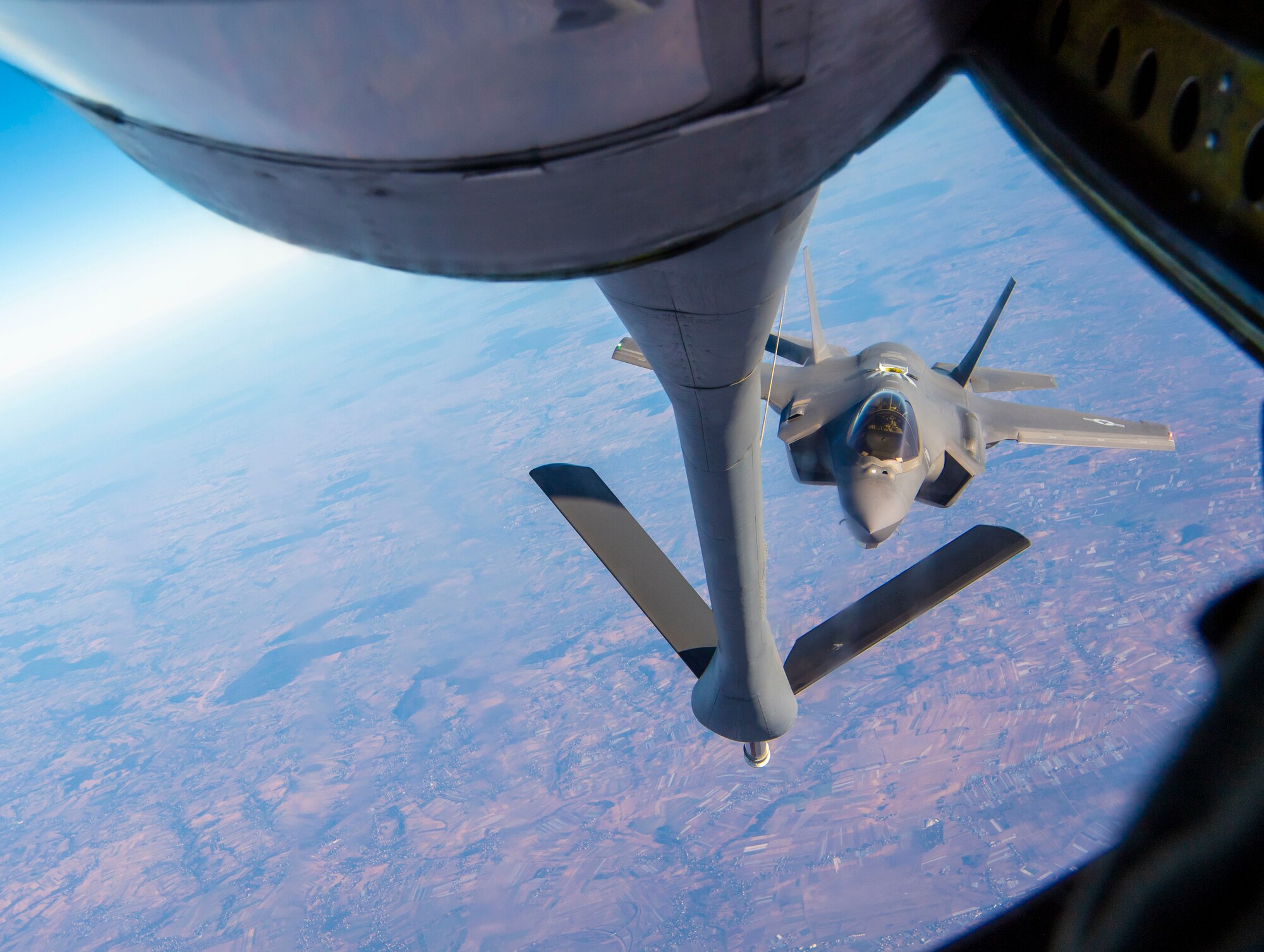An F-35A Lighting II assigned to Hill Air Force Base, Utah approaches a boom to receive fuel from a KC-135 Stratotanker assigned to Fairchild Air Force Base, Washington, March 22, 2022. Airmen assigned to Fairchild AFB were sent to Spangdahlem AB to provide additional air refueling support while Airmen assigned to Hill AFB were sent to reinforce and bolster deterrence and defense capabilities of the NATO alliance. (U.S. Air Force photo by Airman 1st Class Jessica Sanchez-Chen)
