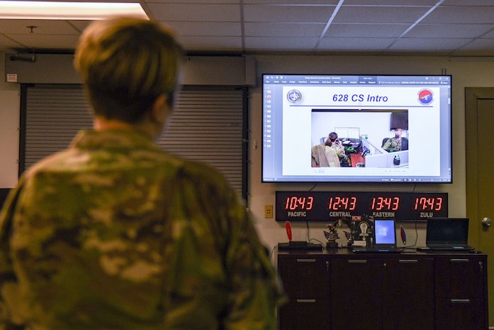 Base leader speaks with Airman