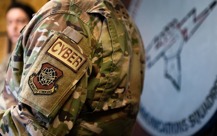 Base leader speaks with Airman