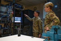 Base leader speaks with Airman