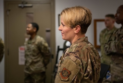 Base leader speaks with Airman