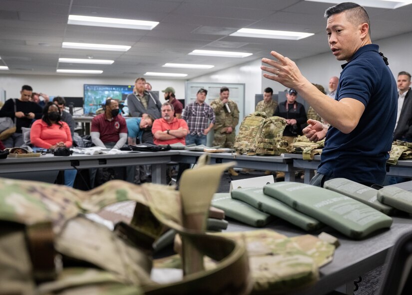 Neal Nguyen, lead systems engineer for Product Manager Soldier Protective Equipment at Program Executive Office (PEO) Soldier, discusses the modular scalable vest and its new plates to an audience during a gear comparison event on Fort Belvoir, March 8. The event provided a familiarization of selected items from Project Manager Soldier Survivability and the U.S. Army Special Operations Command’s respective portfolios for a side-by-side comparison, in order to gain knowledge and identify opportunities for collaboration in the future.