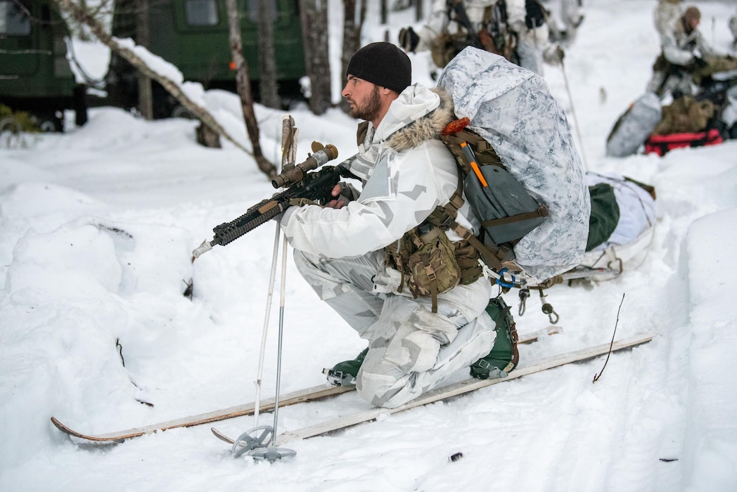Tech. Sgt. Justin Kumor, a special reconnaissance specialist with the Kentucky Air National Guard’s 123rd Special Tactics Squadron, takes up a defensive position during an exercise in Grubbnäsudden, Sweden, Jan. 19, 2022. Fifteen members from the 123rd STS — including combat controllers; pararescuemen; special reconnaissance personnel; search, evasion, resistance and escape troops; and support Airmen — came here to build upon their relationship with European partners during an arctic warfare training course. (U.S. Air National Guard photo by Phil Speck)