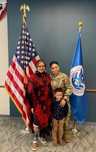 Airman 1st Class Martha Magallon Ochoa, right, poses with her son, Camden Magallon Ochoa, middle, and her wife, Samantha Magallon Ochoa, at her naturalization ceremony on March 28, 2022. (Courtesy photo)