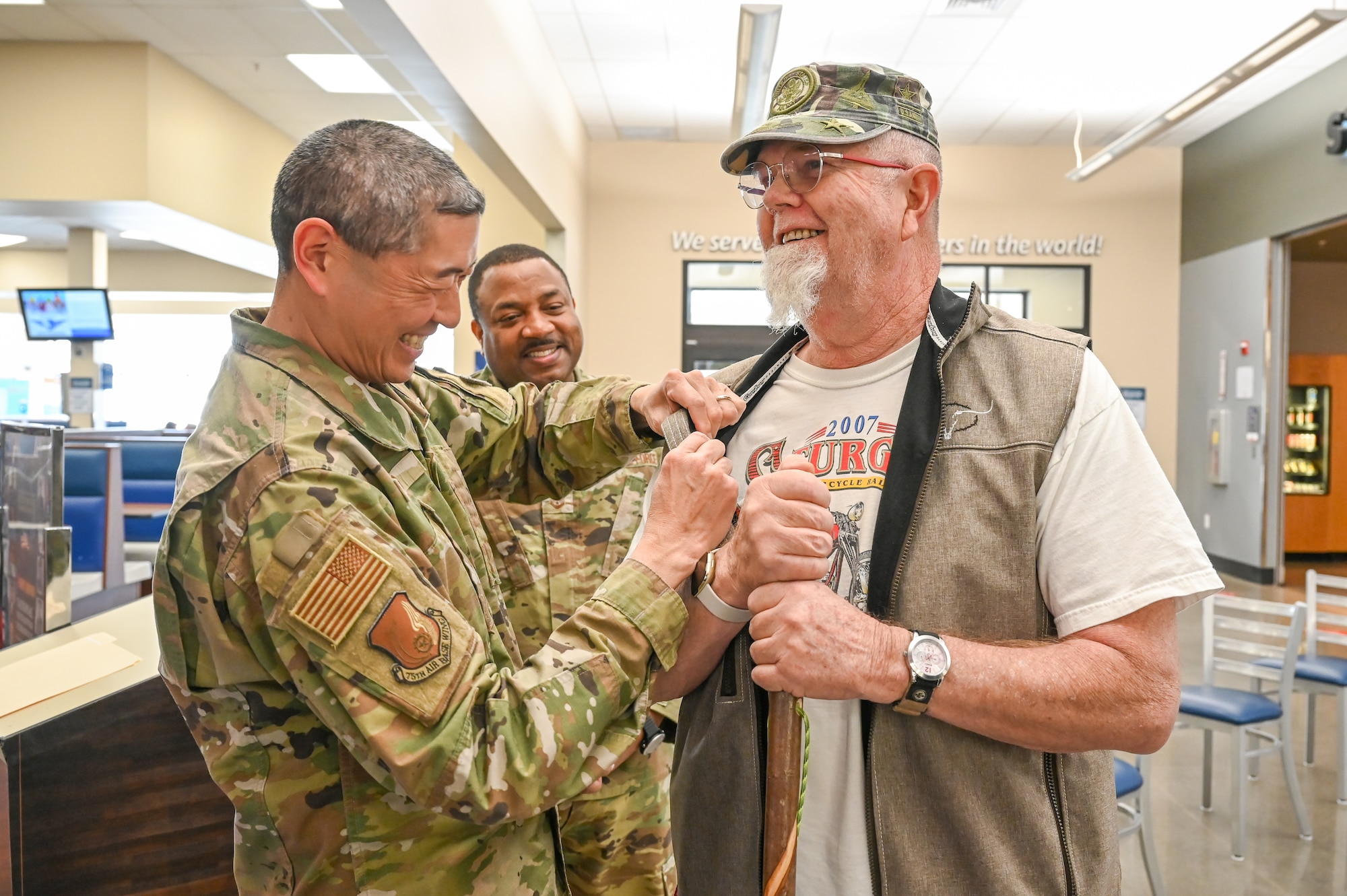Col. Peter Feng, 75th Air Base Wing vice commander (left), and Chief Master Sgt. Raymond Riley, 75th Air Base Wing command chief, pin retired U.S. Army Sgt. Maj. Guy Gillet during the National Vietnam Veterans Day pinning ceremony March 29, 2022, at Hill Air Force Base, Utah. The Vietnam War Veterans Recognition Act of 2017 established March 29 as the day to honor Vietnam Veterans and their families. (U.S. Air Force photo by Cynthia Griggs)