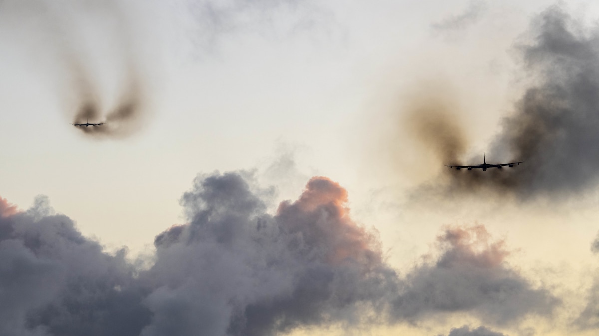 Two U.S. Air Force B-52H Stratofortresses from the 96th Expeditionary Squadron take off upon completion of a Bomber Task Force deployment at Andersen Air Force Base, Guam, Mar. 9, 2022. Bomber Task Force missions demonstrate lethality and interoperability in support of a free and open Indo-Pacific. (U.S. Air Force photo by Staff Sgt. Lawrence Sena)