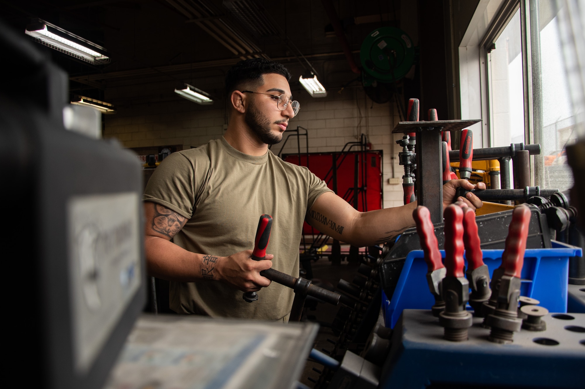 Airman prepares his station for welding