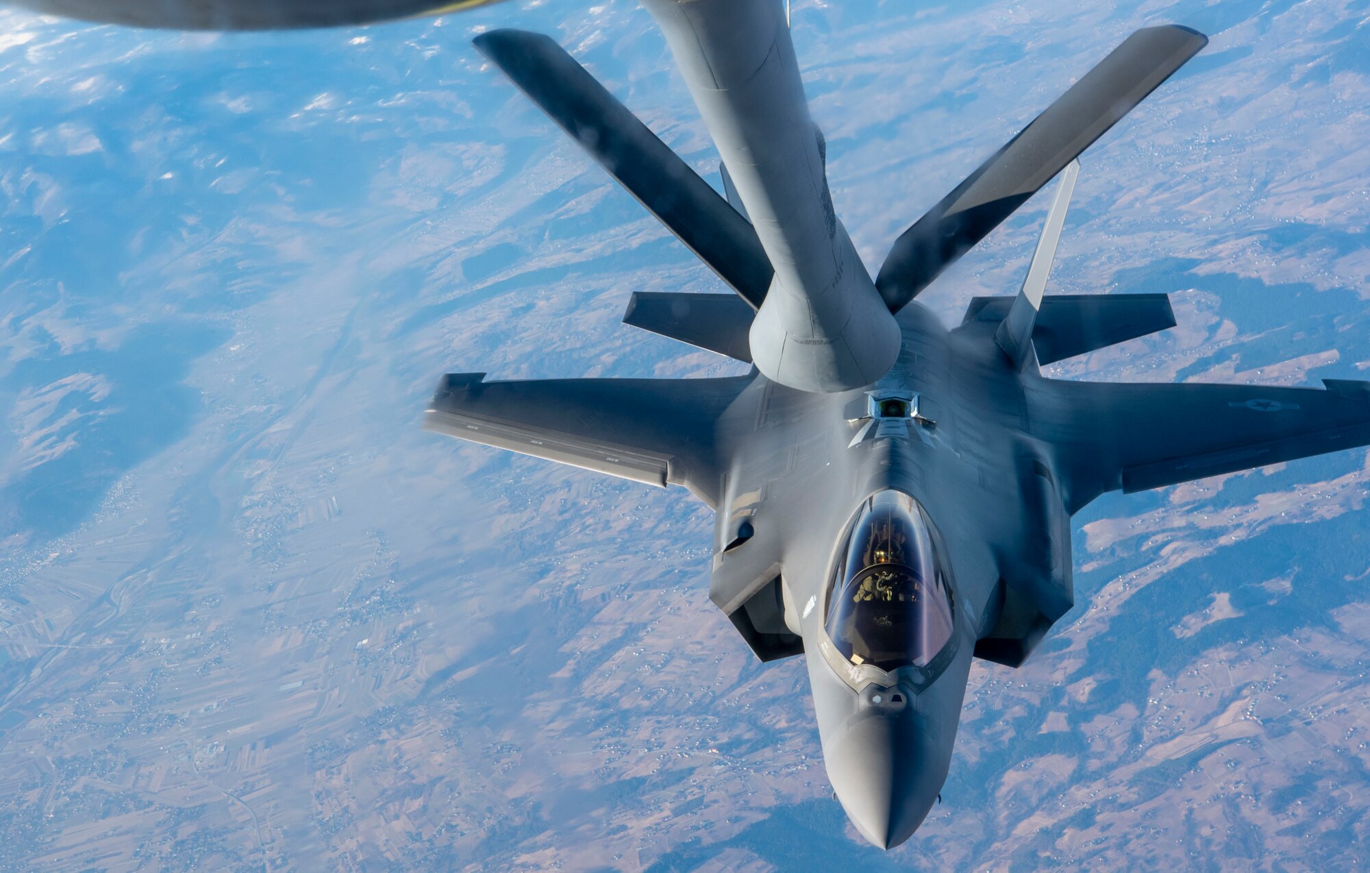 An F-35A Lightning II assigned to Hill Air Force Base, Utah approaches a boom to receive fuel from a KC-135 Stratotanker assigned to Fairchild Air Force Base, Washington, March 22, 2022. Airmen and F-35s from Hill AFB were tasked to bolster deterrence and defense capabilities of the NATO alliance. (U.S. Air Force photo by Airman 1st Class Jessica Sanchez-Chen)