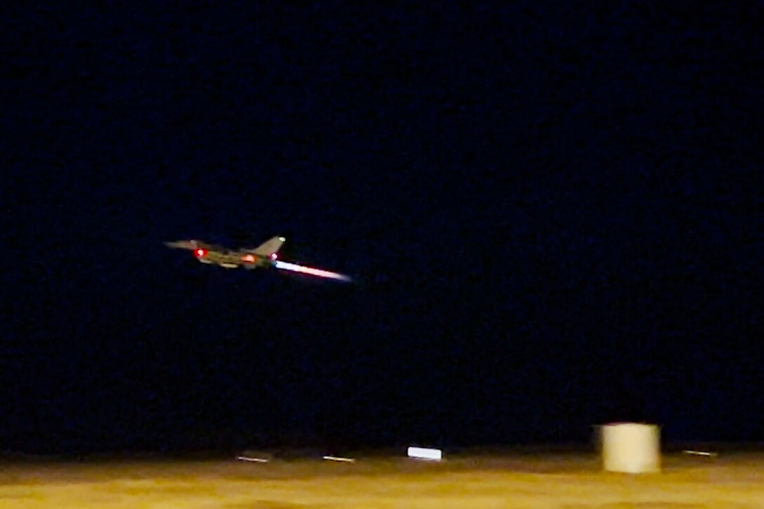 An Air Force F-16 Fighting Falcon takes off during routine night operations.