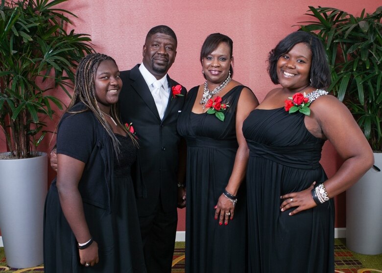 Kansas City District Administrative Assistant Lolita Law (middle right) with her family in August 2014, taken two years before Michael’s cancer diagnosis.