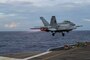 An F/A-18F Super Hornet, assigned to the "Black Aces" of Strike Fighter Squadron (VFA) 41, launches off the flight deck of the Nimitz-class aircraft carrier USS Abraham Lincoln (CVN 72).
