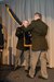 Maj. Gen Michael Turley, adjutant general, Utah National Guard, passes the organizational colors to Brig. Gen. Joseph Green during a change-of-command ceremony March 13, 2022 at Draper, Utah