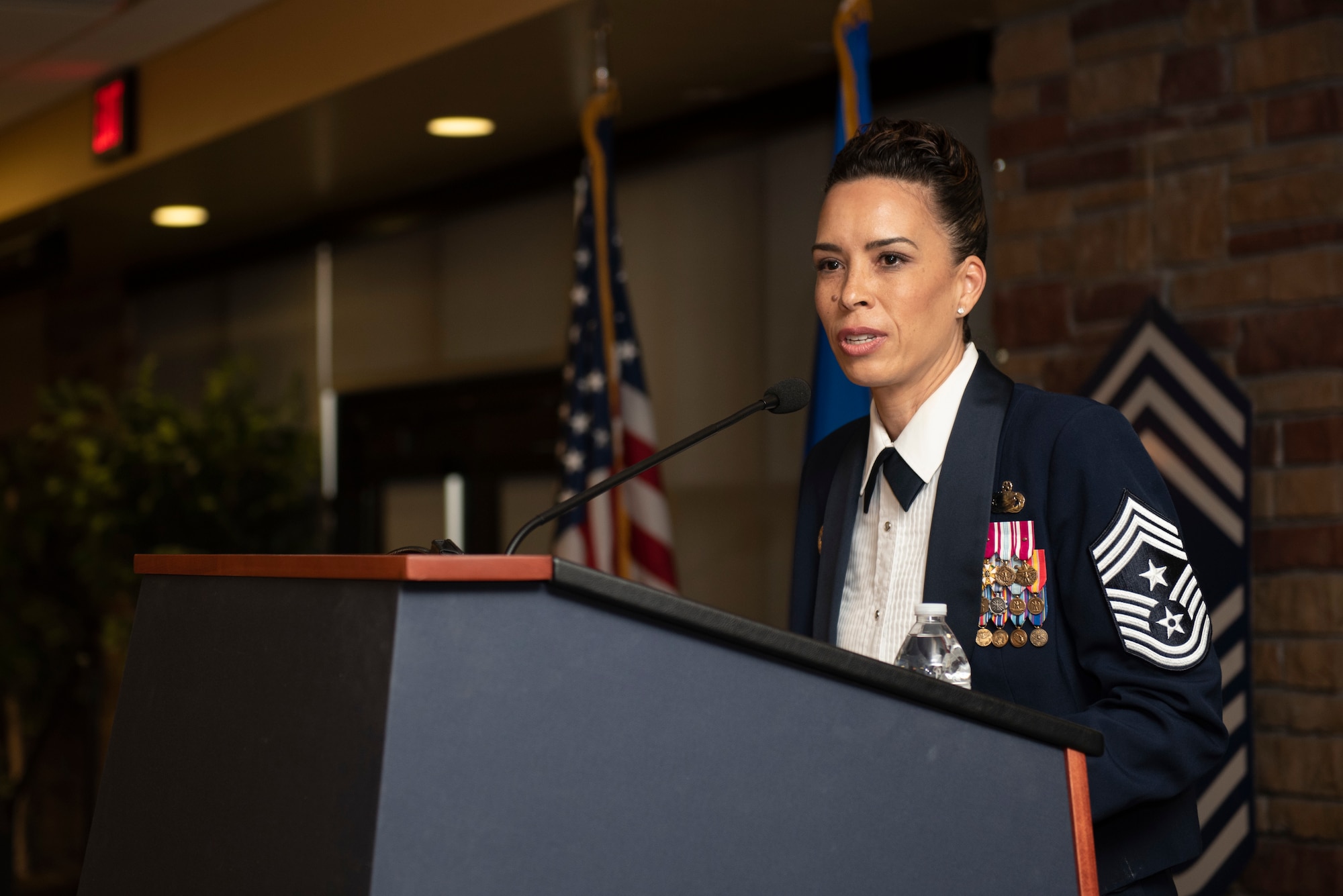 Chief Master Sgt. Kristina Rogers delivers a speech during the Holloman Chief's Group Chief Recognition Ceremony.