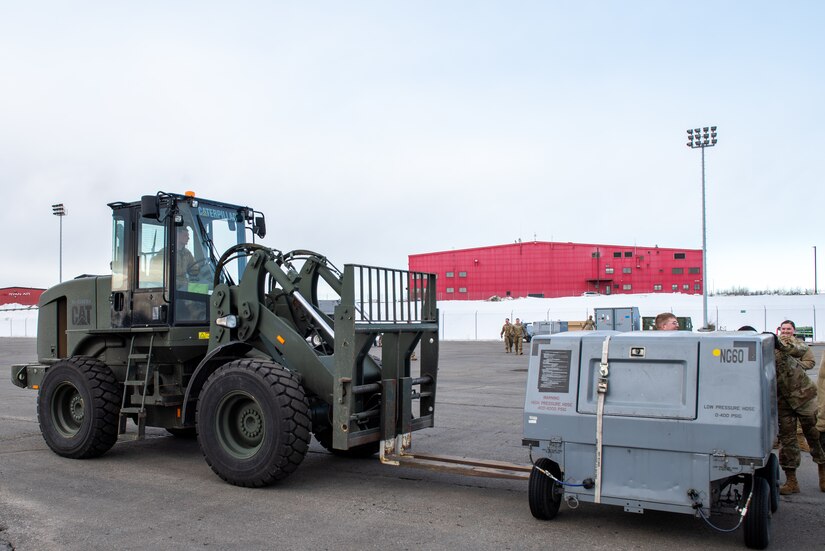 A photo of U.S. Airmen setting up a forward operating base in support of exercise Polar Force 22-4.