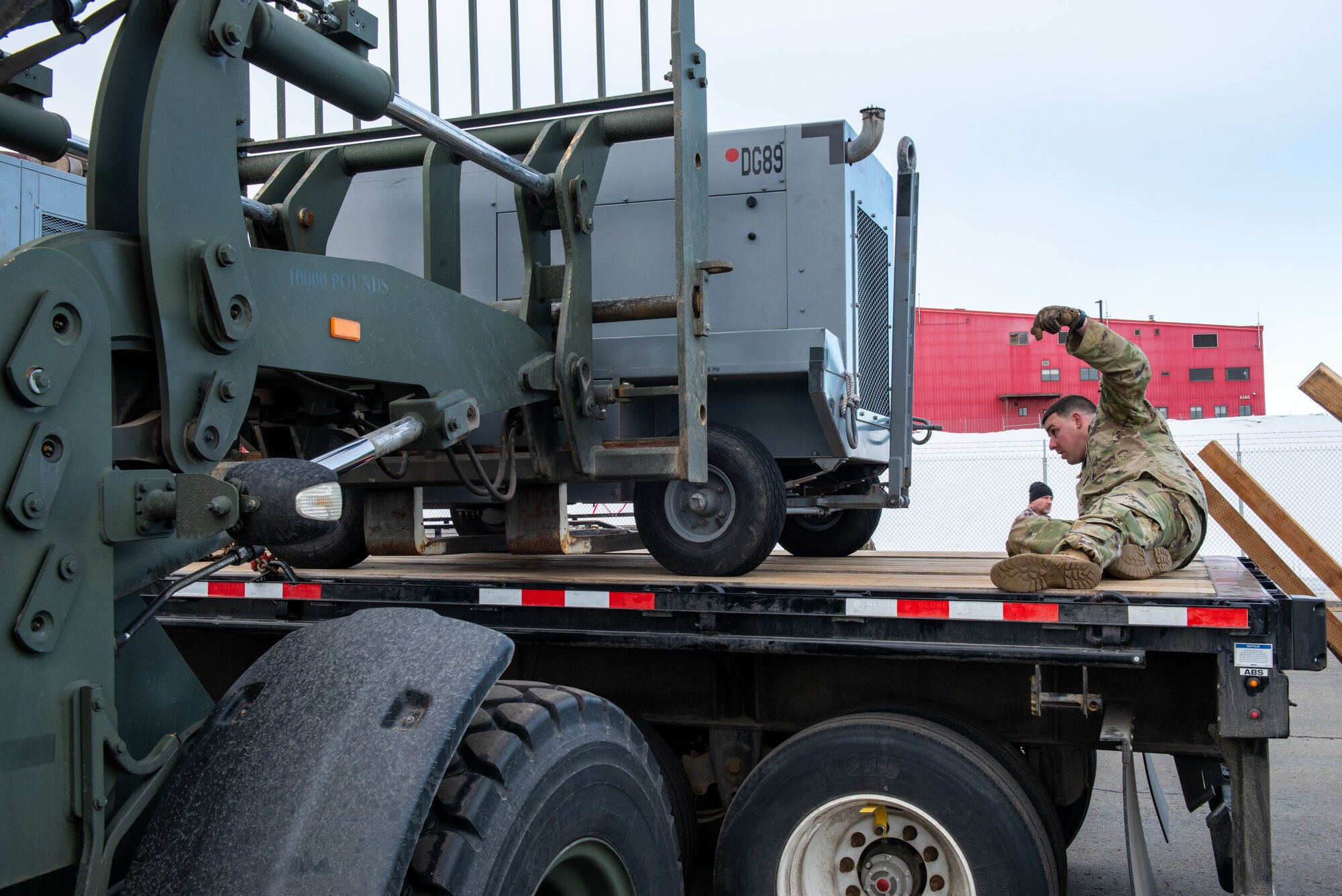 A photo of U.S. Airmen setting up a forward operating base in support of exercise Polar Force 22-4.