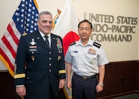 Army Gen. Mark A. Milley, chairman of the Joint Chiefs of Staff, meets with Japan Joint Staff Gen. Koji Kamazaki during a bilateral engagement at Camp Smith, Hawaii, March 29, 2022. (DOD Photo by Navy Chief Petty Officer Carlos M. Vazquez II)