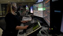 Vanessa L. Kacer, principal engineer, Ronald Reagan Ballistic Missile Defense Test Site Operations Center in Huntsville, Alabama, ensures the Huntsville Mission Control Center is properly configured to support its next mission. (U.S. Army photo by Carrie David Campbell)