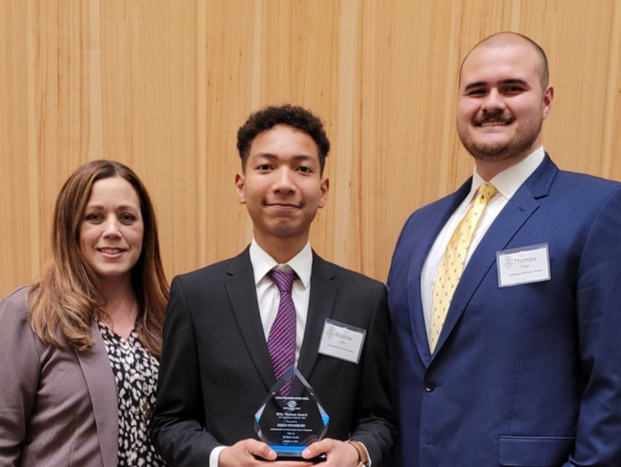 Amanda Resta, 17th Force Support Squadron youth programmer, Myshae Allen, Texas Military Youth of the Year winner, and Thomas Engel, 17th Force Support Squadron school age coordinator, pose for a photo March 21, 2022. (Courtesy Photo)