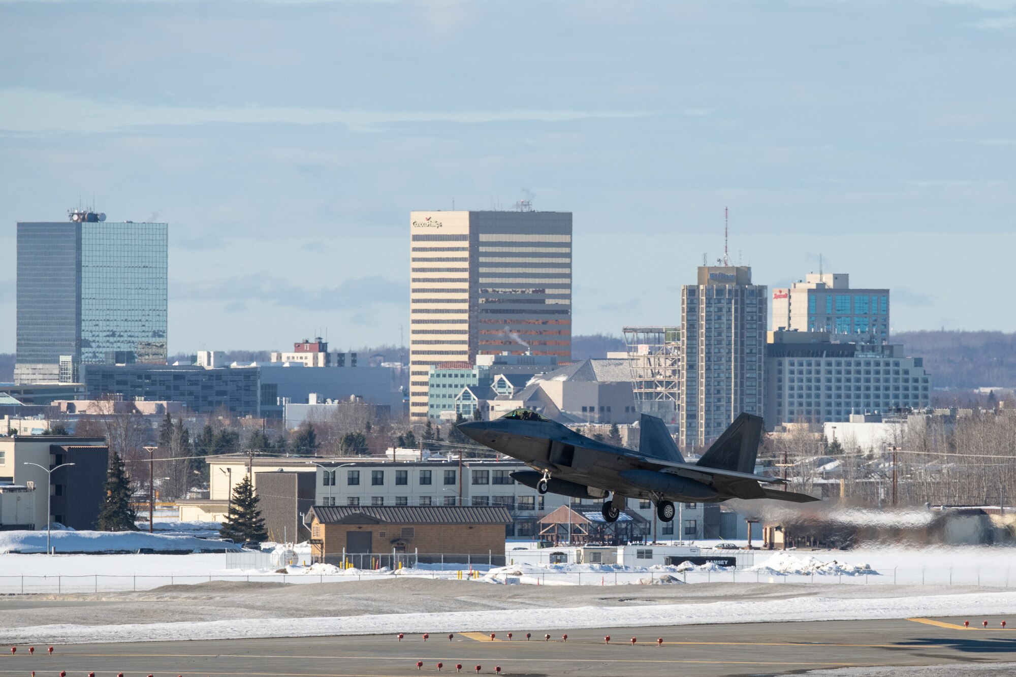 A photo of an F-22 Raptor landing