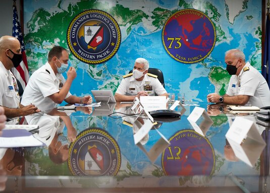 220316-N-JC800-0005 SINGAPORE (MAR. 16, 2022) – (From left) Command Master Chief Jonathon Carter, Capt. Thomas Jenkins, deputy Commander, Logistics Group Western Pacific (COMLOG WESTPAC)/Task Force 73, and Rear Adm. Philip Sobeck, COMLOG WESTPAC meet with (center) Rear Adm. Karl Thomas, Commander, 7th Fleet during a scheduled tour of COMLOGWESTPAC. (U.S. Navy photo by Mass Communication Specialist 2ndClass Heath Zeigler/Released)