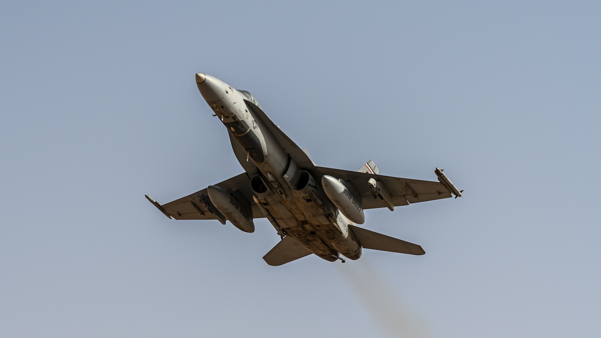 A U.S. Marine F/A-18 Hornet assigned to the Marine Fighter Attack Squadron 115 takes off from Prince Sultan Air Base, Kingdom of Saudi Arabia, Jan. 25, 2022. The F/A-18 is a twin-engine, supersonic, all-weather, carrier-capable, multirole combat jet, designed as both a fighter and attack aircraft. (U.S. Air Force photo by Staff Sgt. Christina A. Graves)