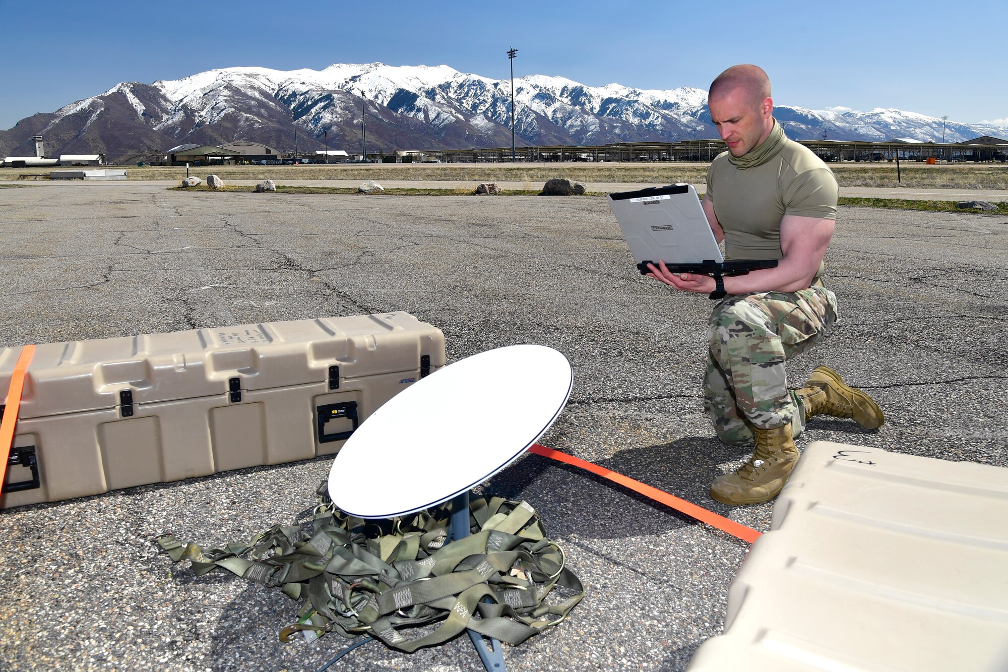 A photo of Airmen setting up communications gear