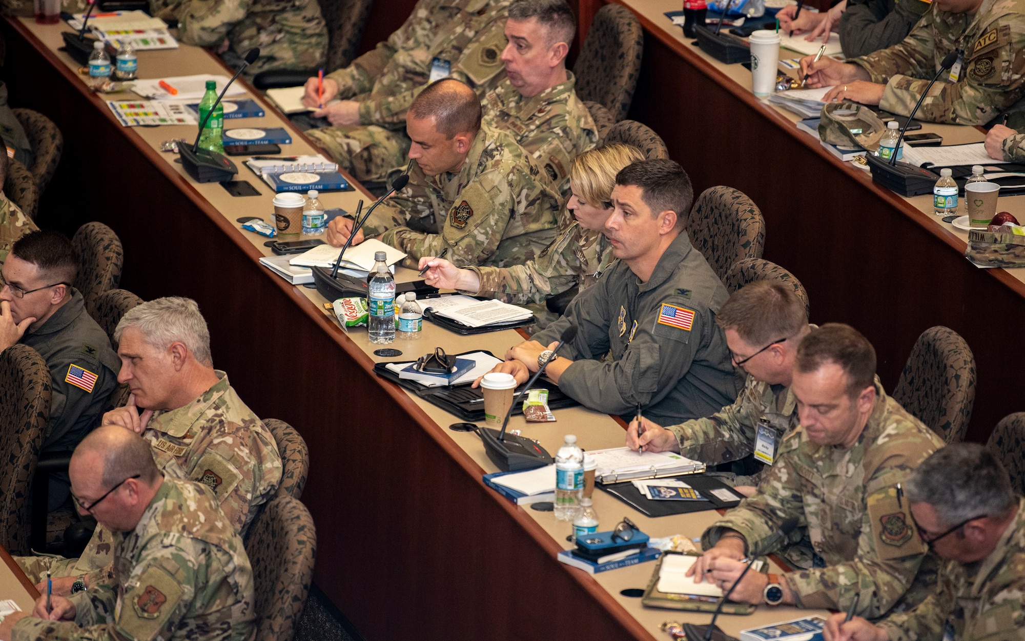 Service members listen to remarks during Phoenix Rally, March 29, 2022 at MacDill Air Force Base, Florida. Spring Phoenix Rally brought together 260 Total Force Mobility Air Force leaders to discuss resiliency of force, Air Mobility Command’s new strategy and priorities and how to work together to ensure that a Mobility Air Force is prepared to deliver Rapid Global Mobility in a peer competitor fight. U.S. Air Force photo by Airman 1st Class Lauren Cobin)