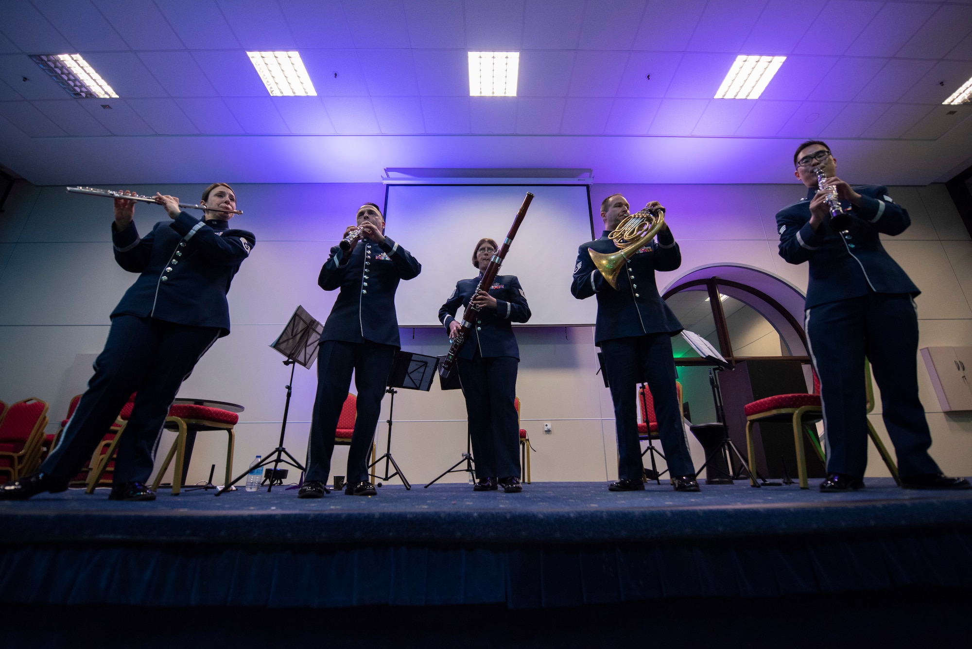 Musicians play on stage.