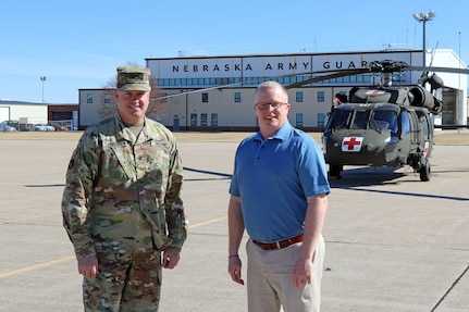 Col. Brent Flachsbart, Nebraska Army National Guard construction and facilities maintenance officer, and Lawrence Vrtiska, environmental program manager for the Nebraska Military Department, outside Army Aviation Support Facility #1 in Lincoln, Neb., March 1, 2022. The Nebraska Army National Guard was awarded 1st place for Natural Resources Management (Individual/Team) in the 2022 Secretary of the Army Environmental Awards for its work with the U.S. Geological Survey and the Crane Trust to study endangered whooping crane behavior during their annual migration through central Nebraska.