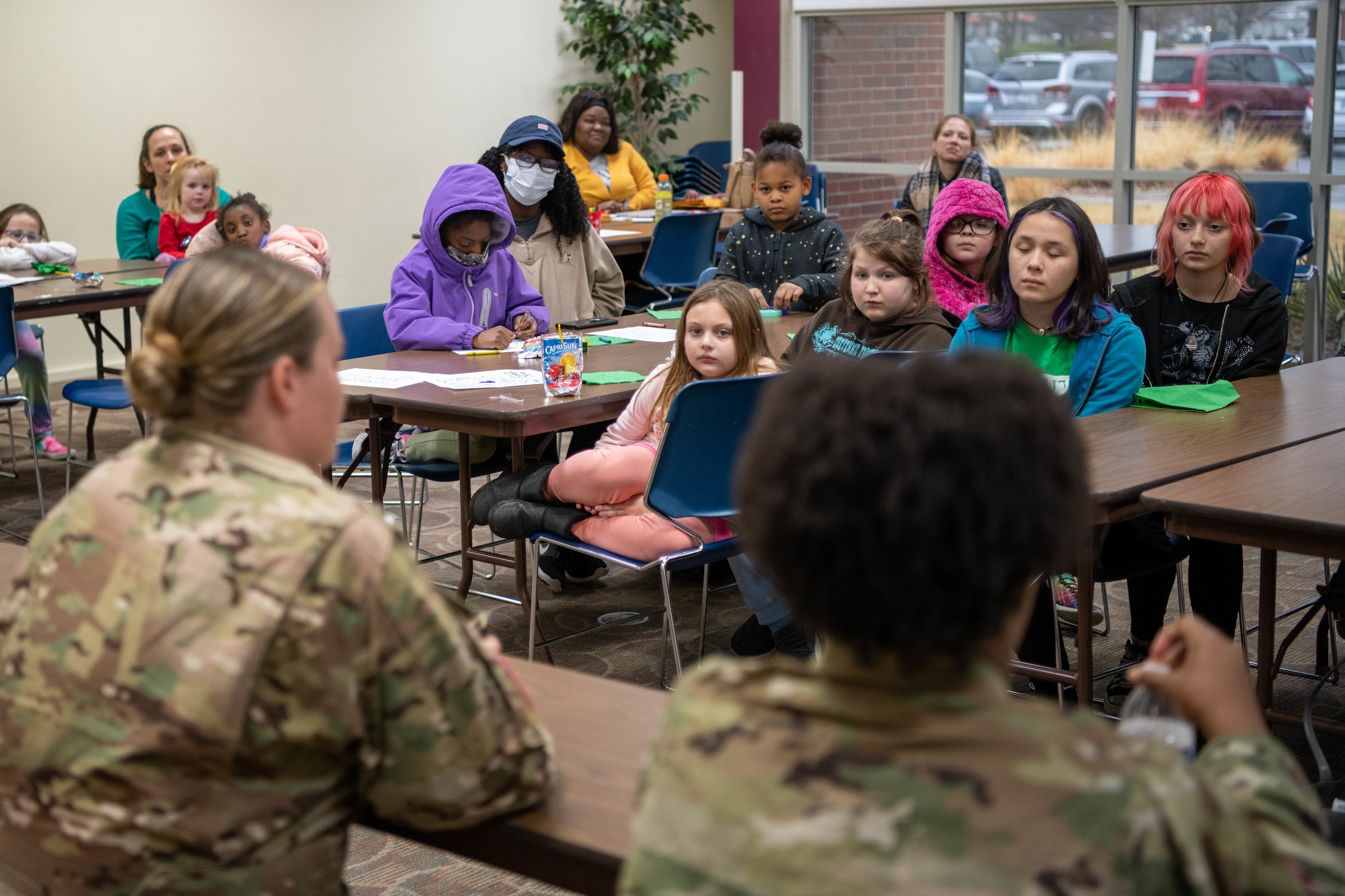 Airmen from the 909th Air Refueling Squadron and 718th Aircraft Maintenance Squadron, participate in a community outreach event with Girl Scouts in honor of Women’s History Month March 21, 2022 in Wichita, Kansas.