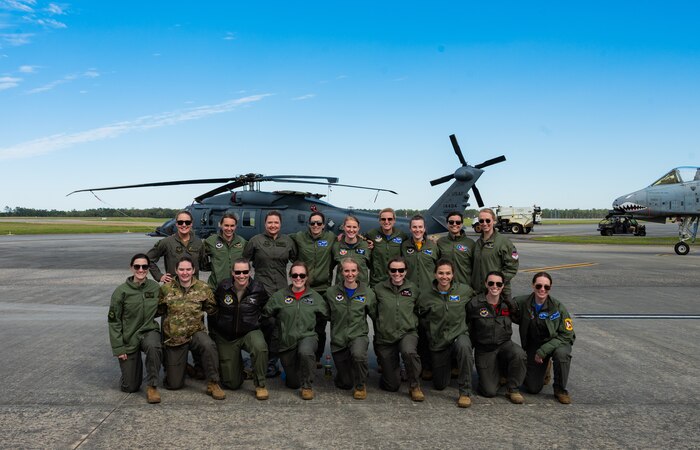 Several all-female aircrews pose at the end of the day during the Youth Open House March 12, 2022, at Moody Air Force Base, Georgia.