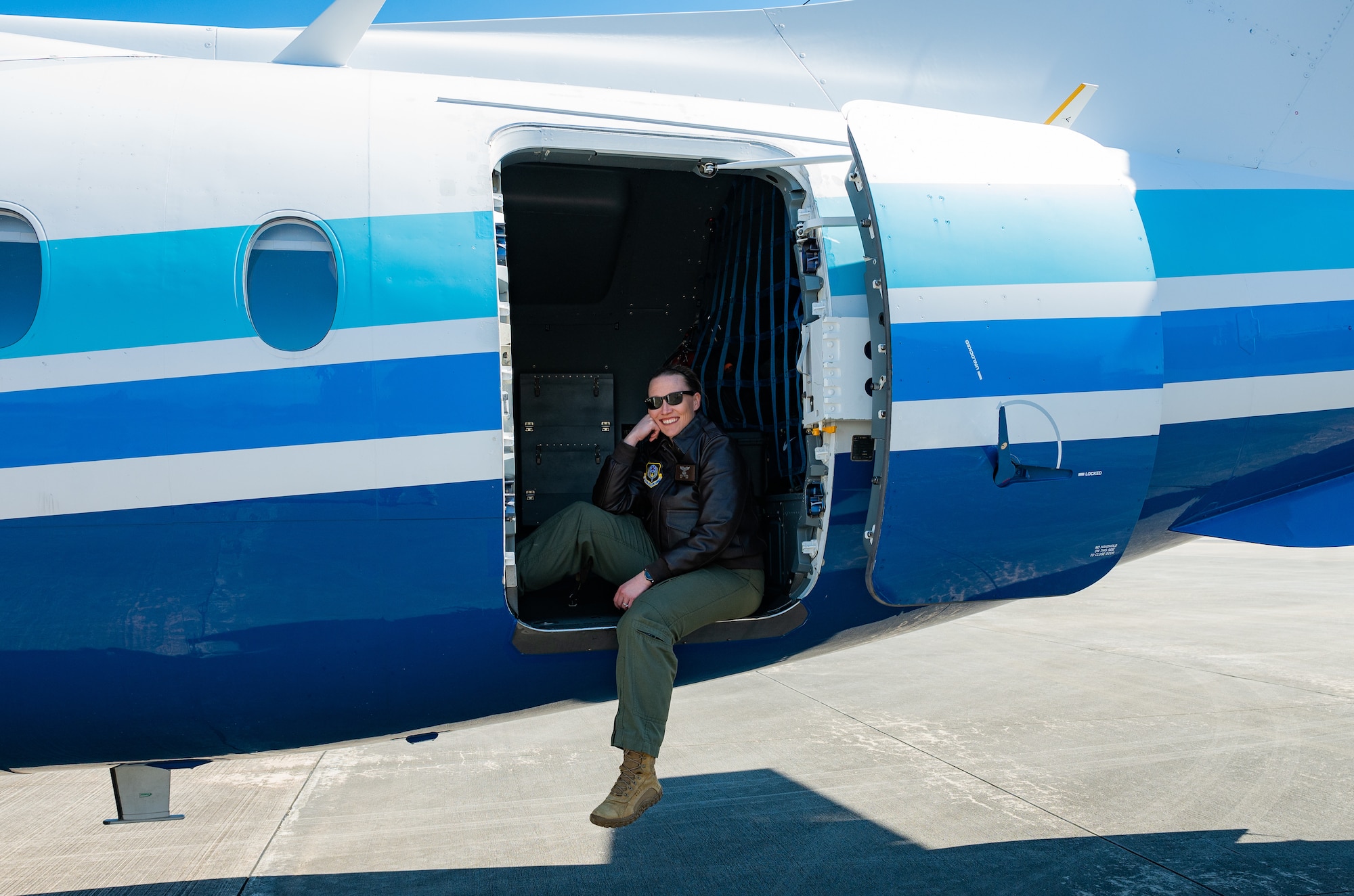 U.S. Air Force Maj. Molly Sexton, a 524th Special Operations Squadron instructor pilot, poses in the back of a C-146A Wolfhound during a youth open house March 12, 2022, at Moody Air Force Base, Georgia.
