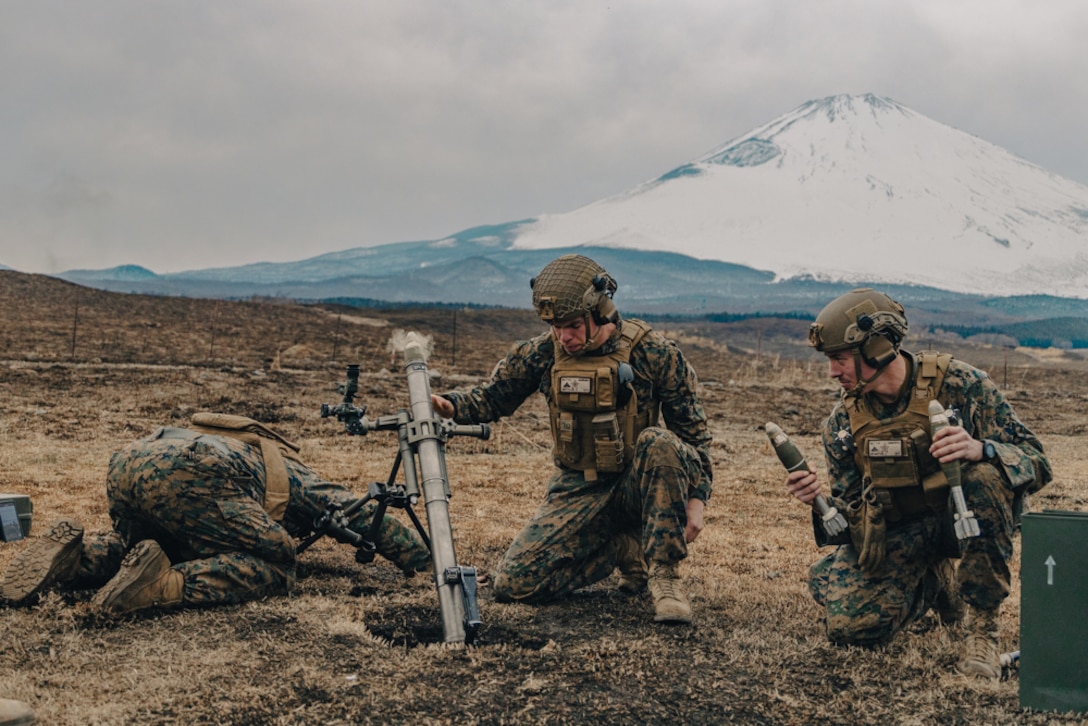 U.S. Marines with Battalion Landing Team 1/5, 31st Marine Expeditionary Unit, fire 60mm and 81mm mortar rounds at Combined Arms Training Center Camp Fuji, Shizuoka Prefecture, Japan, March 23, 2022. BLT 1/5 conducted a live-fire mortars shoot to sustain maritime readiness and to integrate Japanese forces in training for Maritime Defense Exercise Amphibious Rapid Deployment Brigade. MDX-ARDB is a bilateral exercise meant to increase interoperability and strengthen ties between U.S. and Japanese forces for the defense of Japan.