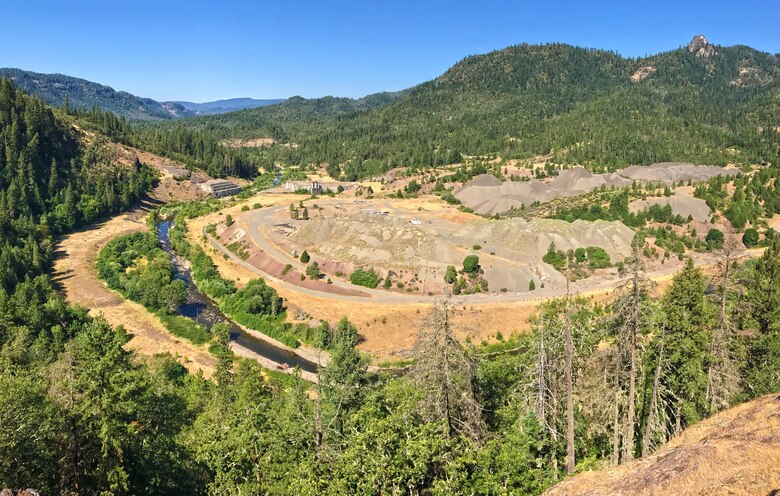 The Elk Creek project was initiated in 1971, the third dam authorized by Congress to be built in the Rogue River Basin.  After years of litigation the project was stopped in 1988, leaving an incomplete dam 83 feet tall, one-third its designed height. Once construction was stopped, plans were developed to restore Elk Creek to a free-flowing creek.  The dam was notched on Aug. 17, 2008, and the Corps diverted Elk Creek into the new channel on Sept. 15, 2008.