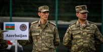 Azerbaijani forces stand in formation for the opening ceremony of exercise Rapid Trident, Yavoriv, Ukraine, Sept. 3 2018. (Photo by: Pfc. Andrea Torres, ARNG)