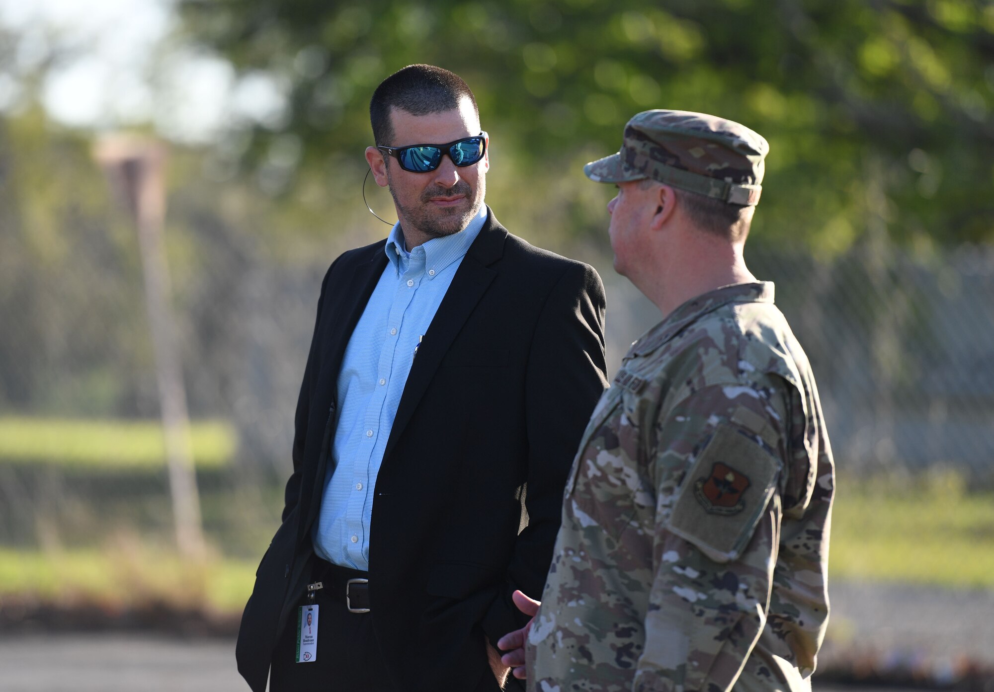 U.S. Air Force Lt. Col. David Mays, 81st Mission Support Group deputy commander, speaks with Marcus Boudreaux, Biloxi School District superintendent, during the Month of the Military Child proclamation reading outside the Youth Center at Keesler Air Force Base, Mississippi, March 31, 2022. The Month of the Military Child is celebrated throughout the month of April. (U.S. Air Force photo by Kemberly Groue)