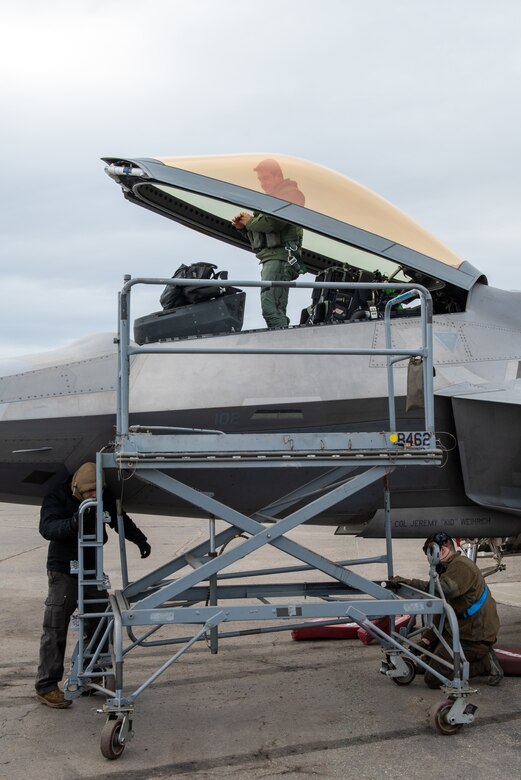 U.S. Airmen recover an F-22 Raptor aircraft during exercise Polar Force 22-4.