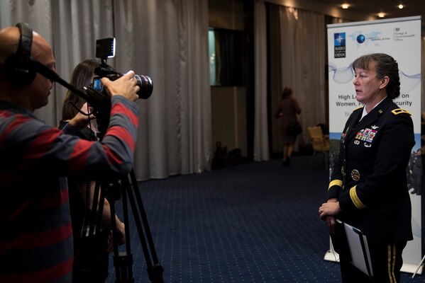 An officer gives an interview on the Women Peace and Security effort.