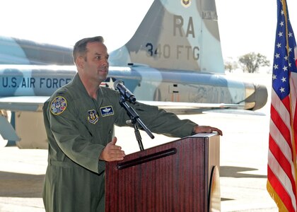 Col. Kyle Goldstein addresses guests, attendees, and personnel after assuming command of the 340th Flying Training Group at Joint Base San Antonio-Randolph, Texas, on March 31, 2022.