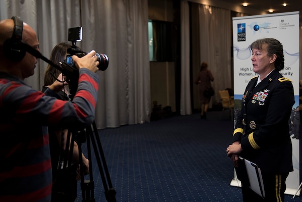 An officer gives an interview on the Women Peace and Security effort.