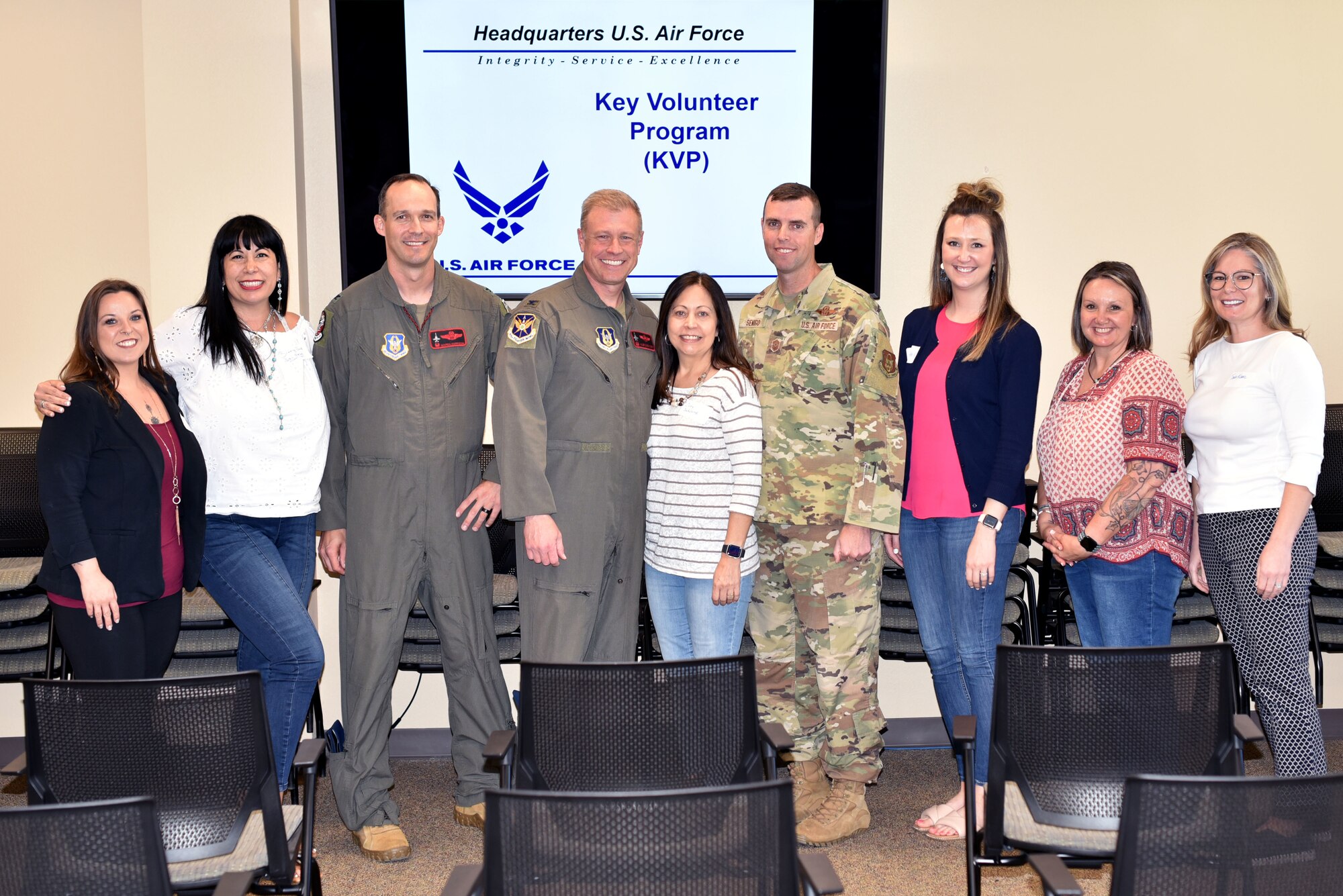 Key Volunteers stand with 301st Fighter Wing leadership during the Key Volunteers Program introduction at Naval Air Station Joint Reserve Base Fort Worth, Texas on May 1st , 2022. The Key Volunteers Program introduction brings old and new volunteers together to inform them of the 301st FW's mission to train and deploy combat ready Airmen. (U.S. Air Force photo by Staff Sgt. Randall Moose)