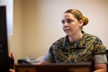 U.S. Marine Corps Cpl. Stephanie E. Grundmann, a legal chief with Headquarters and Headquarters Squadron, processes an administrative request on Marine Corps Air Station (MCAS) New River in Jacksonville, North Carolina, April 20, 2022. Grundmann, the recipient of the MCAS New River Go-Getter of the month award, enlisted into the Marine Corps in Aug. 2018 from Cresco, Pennsylvania. (U.S. Marine Corps photo by Lance Cpl. Alexis Sanchez)