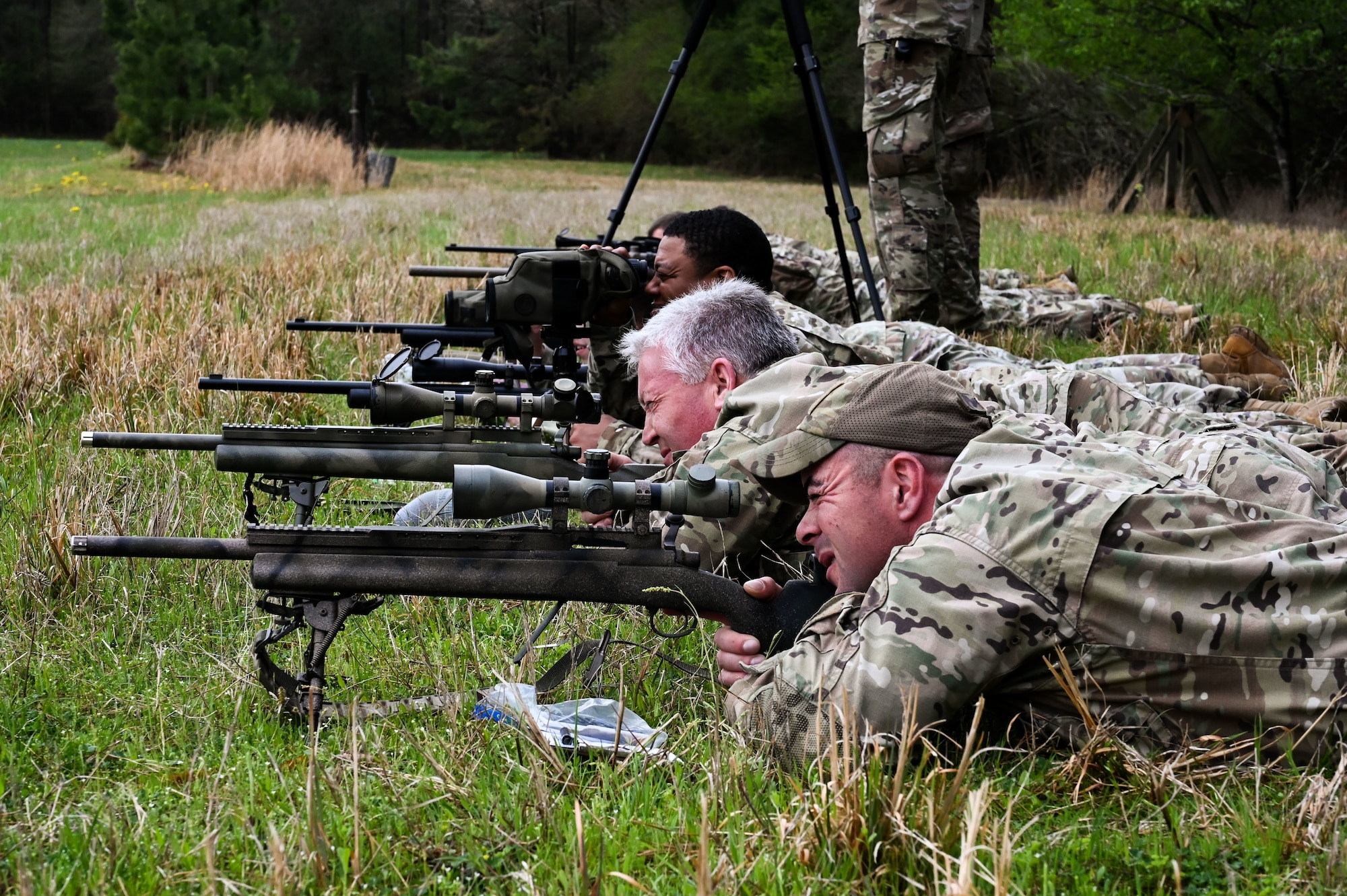 Airmen from the 19th Security Forces Squadron practice spotting targets during an Advanced Designated Marksman course