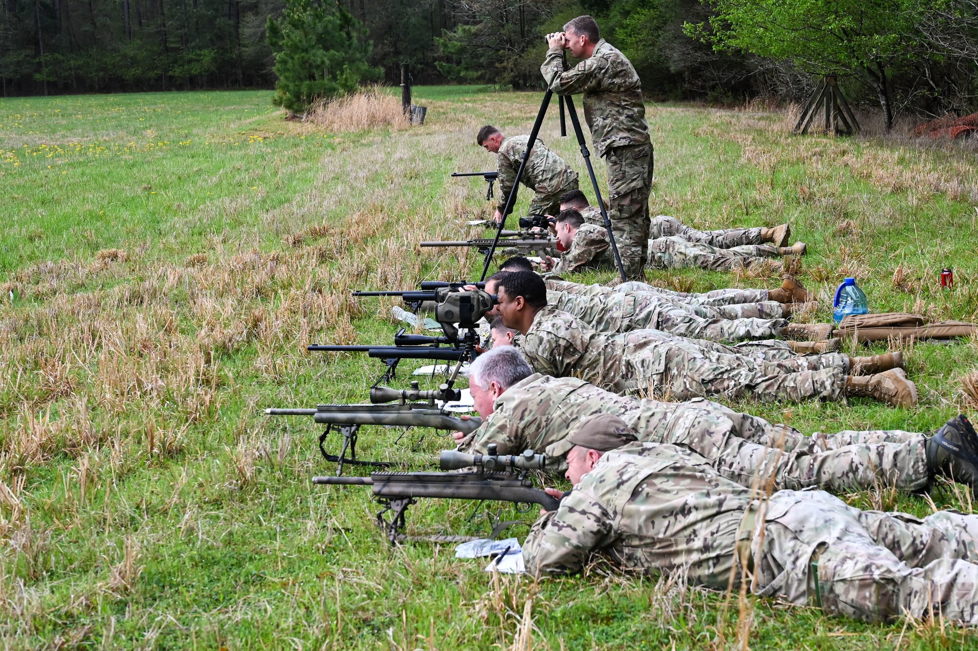 Airmen from the 19th Security Forces Squadron practice spotting targets during an Advanced Designated Marksman course