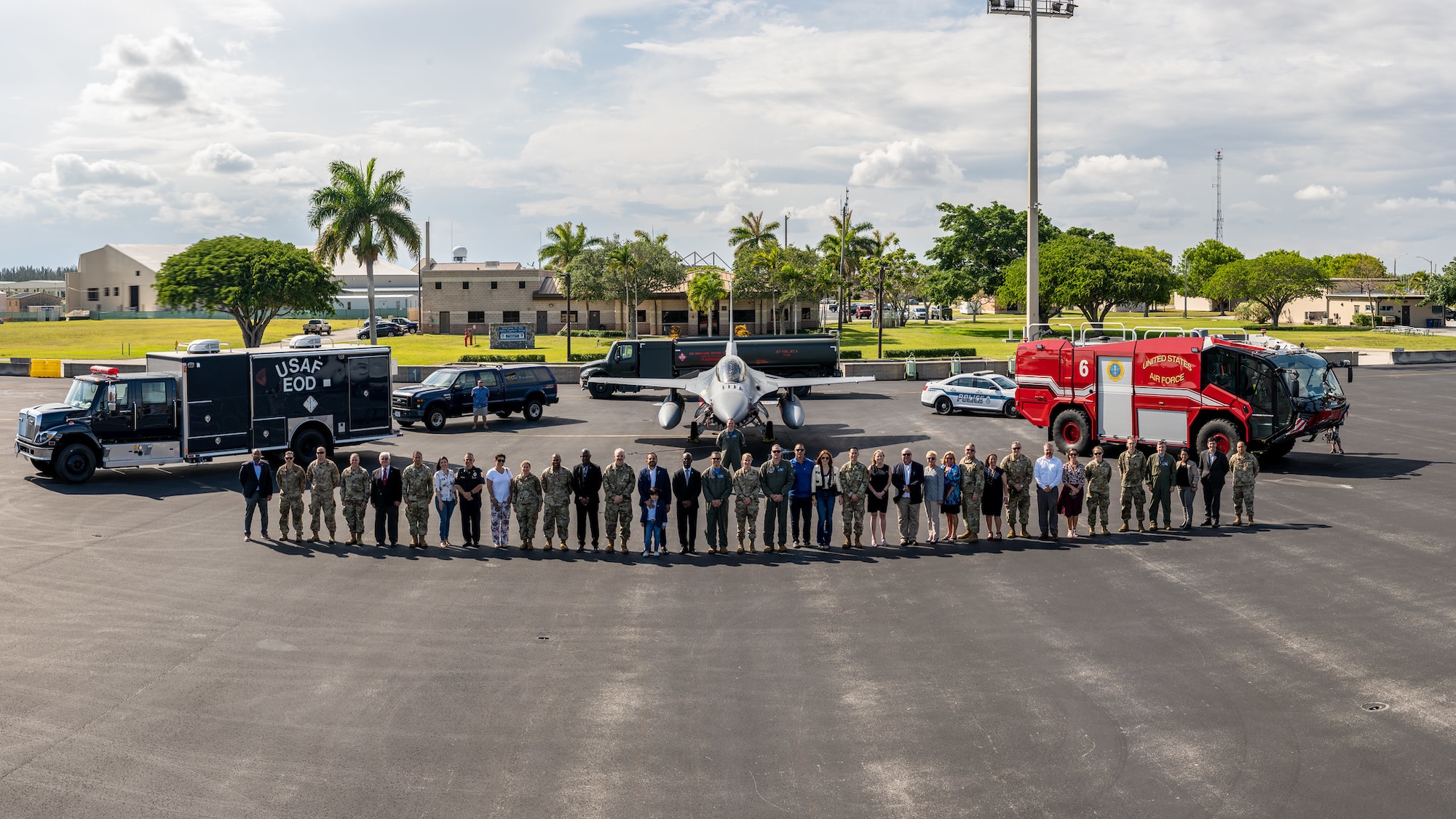 The newest class of 482nd Fighter Wing Honorary Commanders pose for a group picture after a brief induction ceremony at Homestead Air Reserve Base on April 29, 2022.The Honorary Commanders Program is an Air Force sponsored program to encourage an exchange of ideas, sharing experiences and fostering friendships between key civic leaders from the local area and HARB. (U.S. Air Force photo by Tech. Sgt. Leo Castellano)