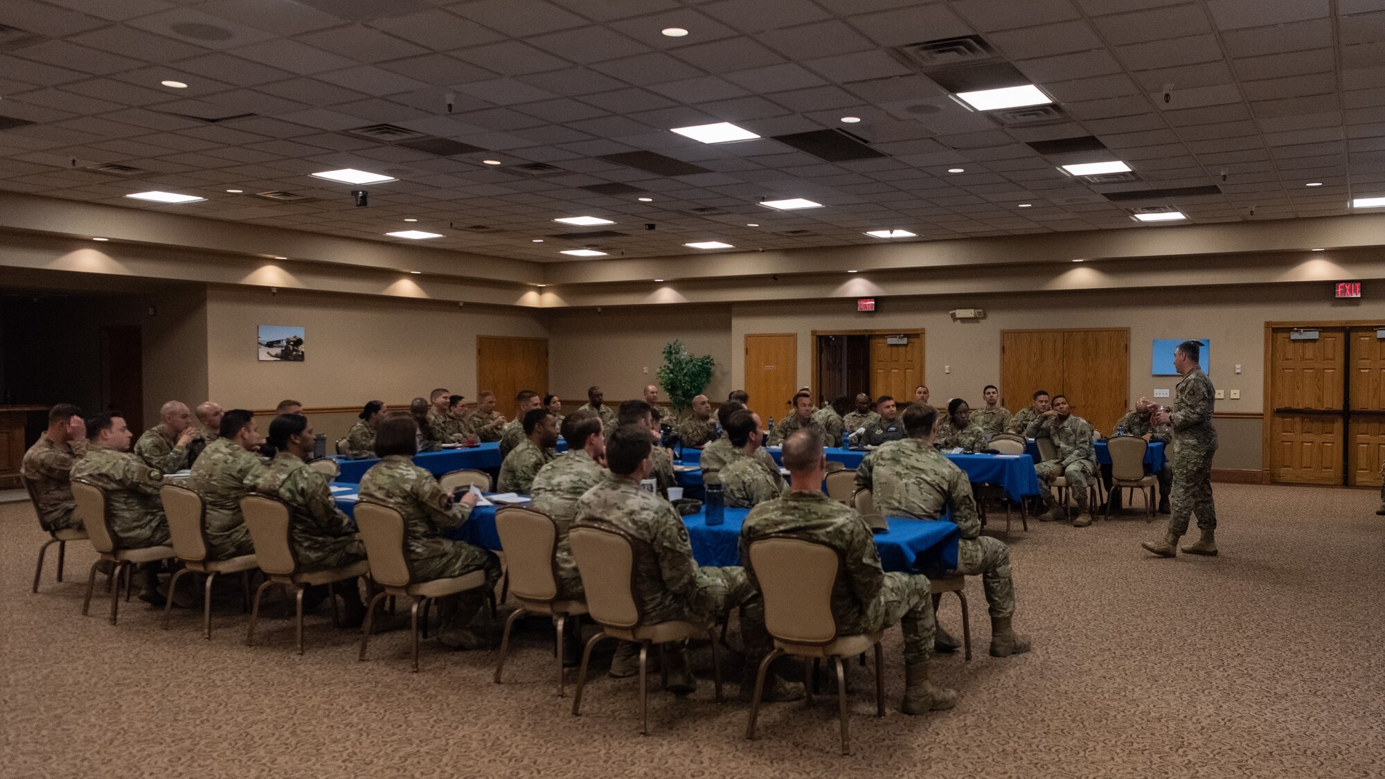 Airmen and Guardians have a working lunch as they have a discussion lead by Chief Master Sgt. Aiello.