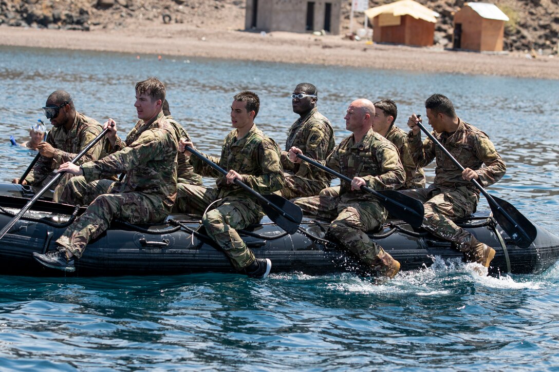 U.S. Army Soldiers assigned to Apache Company, 1-102nd Infantry Regiment (Mountain), Task Force Iron Gray, Combined Joint Task Force – Horn of Africa (CJTF-HOA), practiced waterborne capabilities using Zodiac boats in the Gulf of Aden, Oct. 15, 2021. The Soldiers learned the proper steps for maneuvering the rigid-hulled inflatable boats, and for recovering a flipped watercraft.